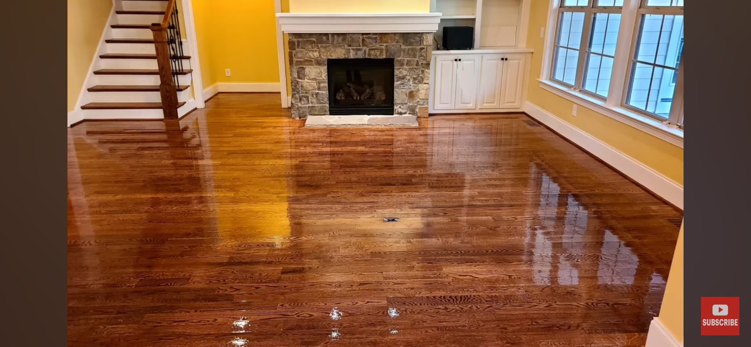 Apex living room hardwood floor after screen and recoat