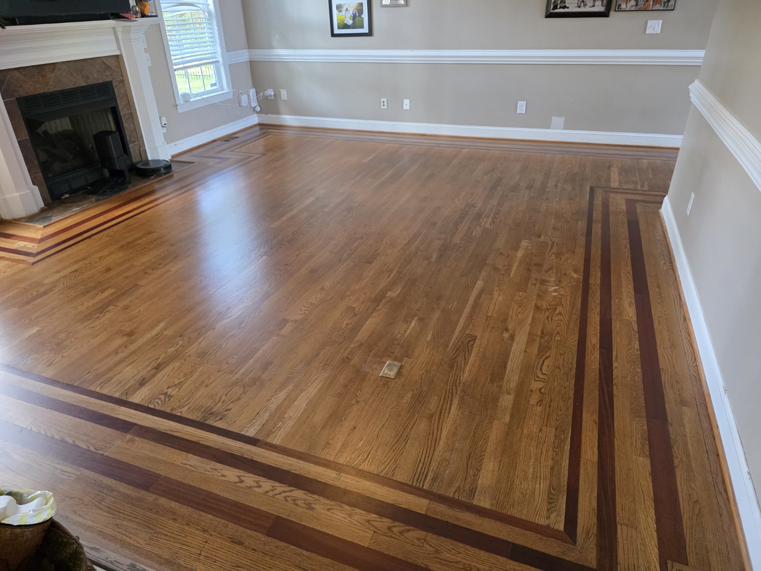 Decorative hardwood border after restoration