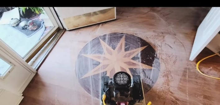 Hardwood medallion before restoration