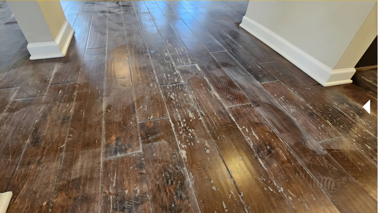 Hallway hardwood before restoration