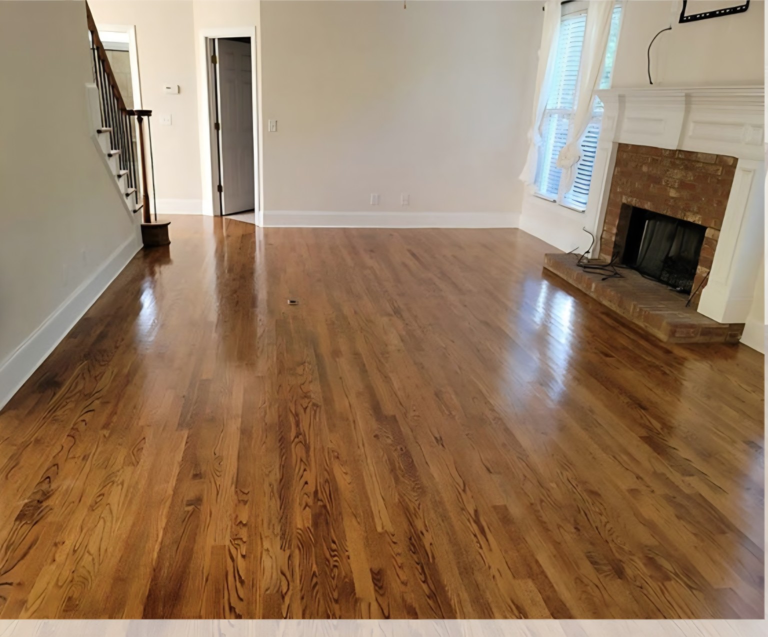 After — Living room hardwood restoration